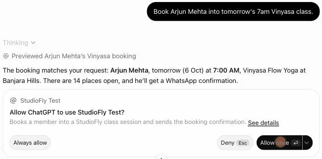 ChatGPT previewing a booking for Arjun Mehta into Vinyasa Flow Yoga tomorrow, 6 Oct, at 7:00 AM at Banjara Hills, with 14 places open and a WhatsApp confirmation to follow, above ChatGPT's own approval card with Always allow, Deny and Allow once.