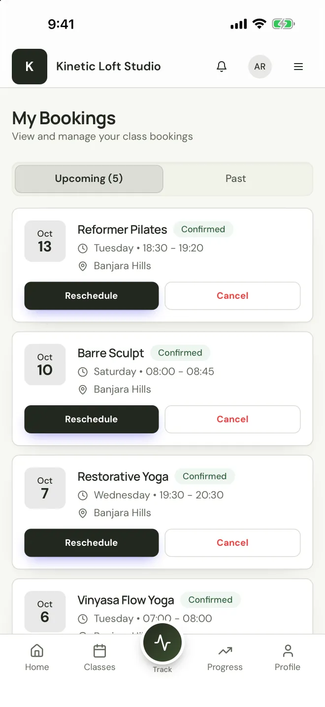 StudioFly member app My Bookings screen with upcoming confirmed classes and Reschedule and Cancel buttons
